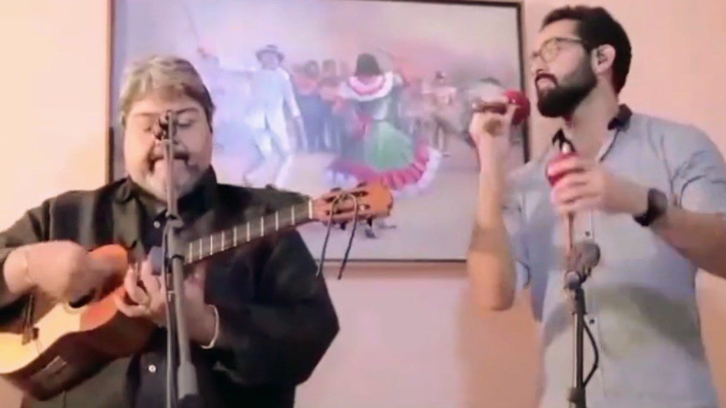 Tico Páez en el cuatro y Manuel Rangel en las maracas